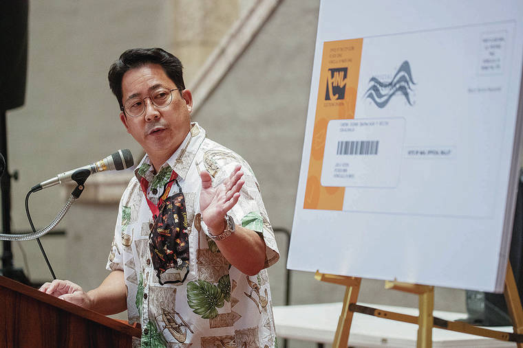 CINDY ELLEN RUSSELL / JULY 14
                                Honolulu City Clerk Glen Takahashi debuted the new ballot envelope for the 2020 Elections at Honolulu Hale.