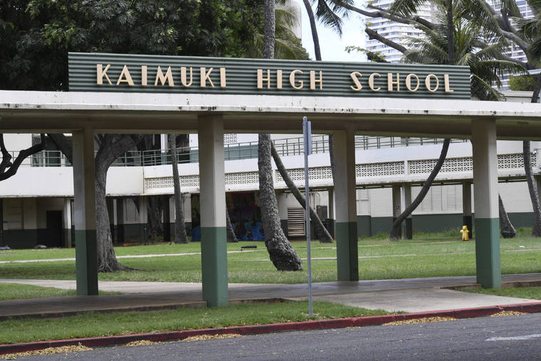 BRUCE ASATO / MARCH 23
                                Kaimuki High School sign. Bruce Keppers, who works as a substitute teacher mostly at McKinley and Kaimuki high schools, was delighted to hear the news that he may collect unemployment insurance this summer.