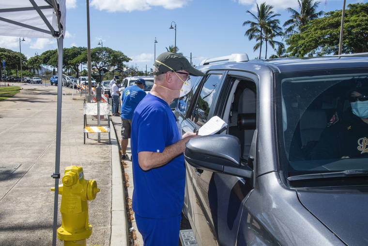 CRAIG T. KOJIMA / CKOJIMA@STARADVERTISER.COM
                                Dr. Scott Miscovich, president and founder of Premier Medical Group, talks to a driver waiting to be tested during drive-thru COVID-19 testing at Kakaako Waterfront Park on Sunday. Of the 164,199 coronavirus tests conducted as of Monday by state and clinical laboratories in Hawaii since the start of the outbreak, a total of 3.2% have been positive.