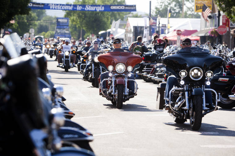 ASSOCIATED PRESS
                                Bikers ride down Main Street in downtown Sturgis, S.D., before the 76th Sturgis motorcycle rally in 2016. South Dakota, which has seen an uptick in coronavirus infections in recent weeks, is bracing to host hundreds of thousands of bikers for the 80th edition of the Sturgis Motorcycle Rally. Over a quarter of a million people are expected to rumble through western South Dakota.