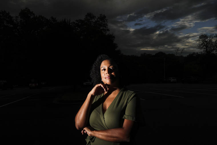 ASSOCIATED PRESS
                                Charisse Davis posed for a portrait, July 24, in Marietta, Ga. Davis was recently elected the only Black woman on the Cobb County School Board.