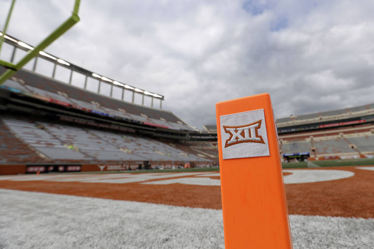 ASSOCIATED PRESS
                                A Big 12 pylon marks the end zone at Darrell K Royal Texas Memorial Stadium before an NCAA college football game between Texas and Kansas State in Austin, Texas, in 2017. Big 12 schools have agreed to play one nonconference football game this year to go along with their nine league contests as plans for the pandemic-altered season continued to fall into place.
