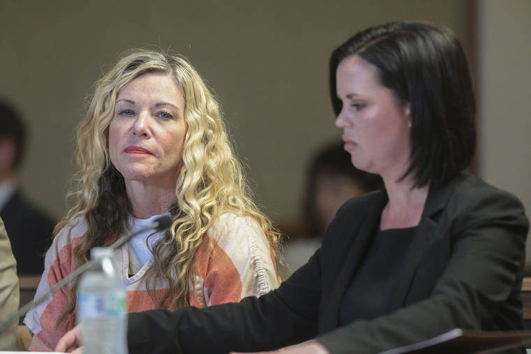 ASSOCIATED PRESS / MARCH 6
                                Lori Vallow Daybell glances at the camera during her hearing, with her defense attorney, Edwina Elcox, right, in Rexburg, Idaho, in March. An Idaho prosecutor today began sketching out his case against an Idaho couple at the center of a bizarre missing children’s case that ended in tragedy when their bodies were found buried on a rural eastern Idaho property earlier this year.