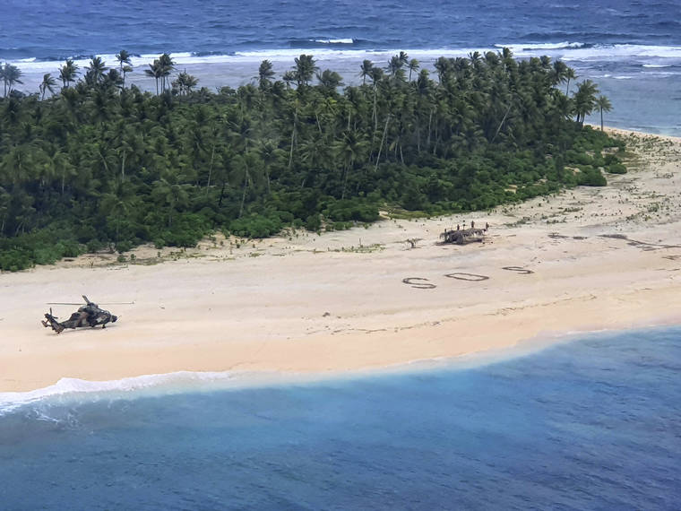 AUSTRALIAN DEFENCE FORCE VIA ASSOCIATED PRESS
                                An Australian Army helicopter landed on Pikelot Island in the Federated States of Micronesia, where three men were found, Sunday, safe and healthy after missing for three days.