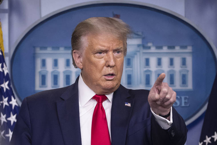 ASSOCIATED PRESS
                                President Donald Trump pointed, Monday, to a reporter as he spoke during a media briefing in the James Brady Press Briefing Room of the White House, in Washington. Trump’s demand that the U.S. government get a cut of Microsoft buying TikTok is the latest unprecedented scenario in an unprecedented situation.