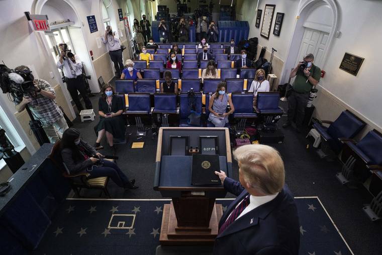 ASSOCIATED PRESS
                                President Donald Trump arrives to speak during a briefing with reporters in the James Brady Press Briefing Room of the White House today in Washington.