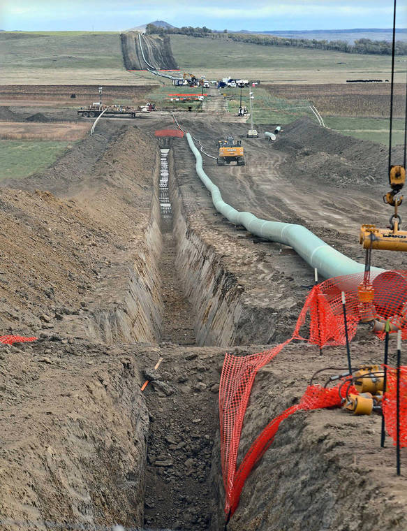 TOM STROMME/THE BISMARCK TRIBUNE VIA ASSOCIATED PRESS
                                Construction continued, in October 2016, on the Dakota Access pipeline. A federal appeals court, today, reversed a judge’s order that shut down the Dakota Access pipeline pending a full environmental review.