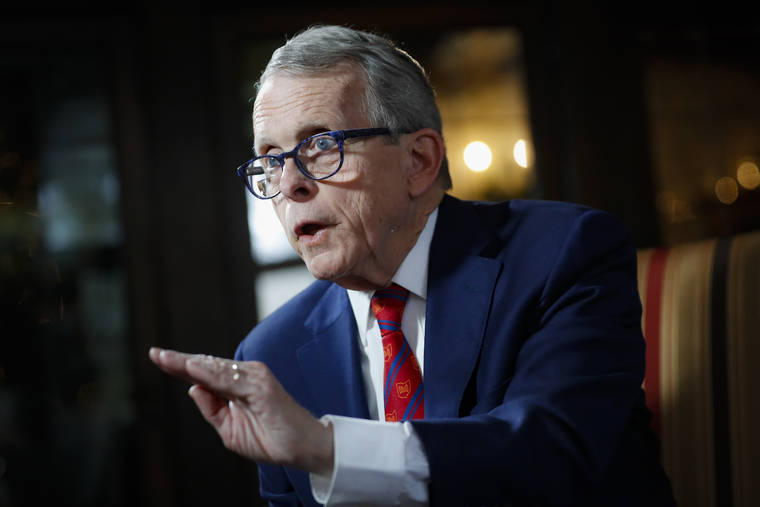 ASSOCIATED PRESS
                                Ohio Gov. Mike DeWine spoke about his plans for the coming year during a Dec. 13 interview at the Governor’s Residence in Columbus, Ohio. DeWine tested positive today for the coronavirus just ahead a planned meeting with President Donald Trump.
