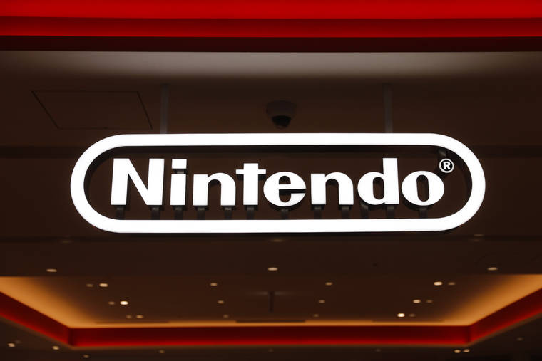 ASSOCIATED PRESS / JAN. 23
                                A Nintendo sign is seen at the company’s official store in the Shibuya district of Tokyo, Thursday, Jan. 23, 2020. Japanese video-game maker Nintendo Co. has scored a 33% jump in annual profit as people stuck at home during the coronavirus pandemic turn to playing games.