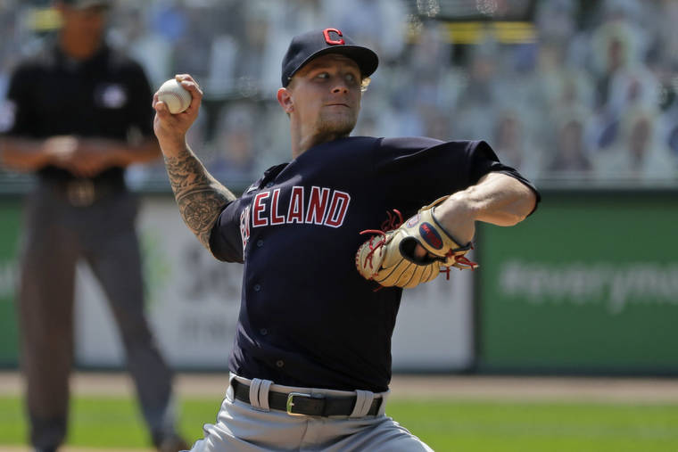 ASSOCIATED PRESS
                                Cleveland Indians starting pitcher Zach Plesac throws against the Chicago White Sox during the first inning of a baseball game in Chicago on Saturday.