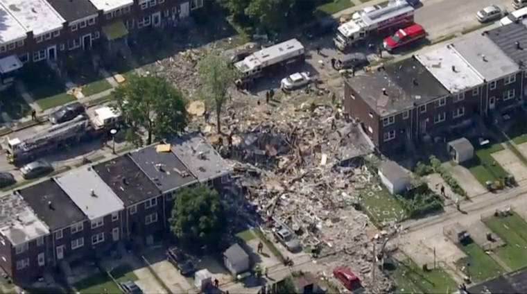 WJLA-TV VIA ASSOCIATED PRESS
                                The scene of an explosion in Baltimore, today. Baltimore firefighters said an explosion has leveled several homes in the city.