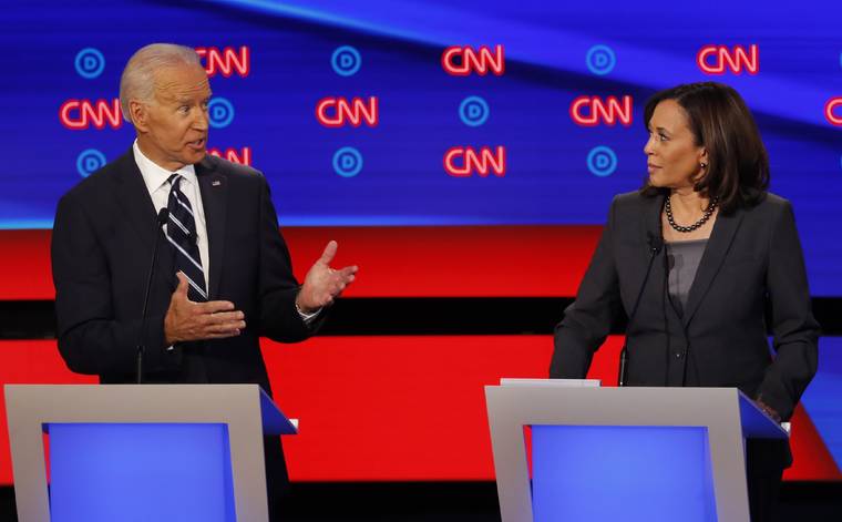 ASSOCIATED PRESS
                                Then-Democratic presidential candidate Sen. Kamala Harris, D-Calif., listens as Democratic presidential candidate former Vice President Joe Biden speaks during a Democratic presidential primary debate at the Fox Theatre in Detroit on July 31, 2019.