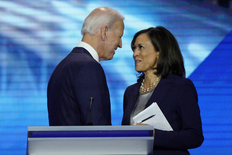 ASSOCIATED PRESS
                                Democratic presidential candidate former Vice President Joe Biden, left, and then-candidate Sen. Kamala Harris, D-Calif. shook hands after a Democratic presidential primary debate, in Sept. 2019, hosted by ABC at Texas Southern University in Houston. Biden is making his first appearance with newly chosen running mate Harris today.