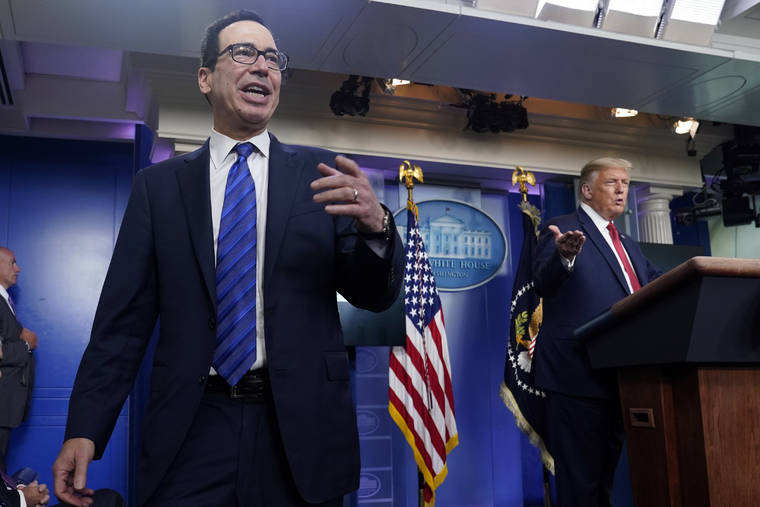 ASSOCIATED PRESS
                                President Donald Trump listened as Treasury Secretary Steven Mnuchin spoke at a news conference in the James Brady Press Briefing Room at the White House, Monday, in Washington.
