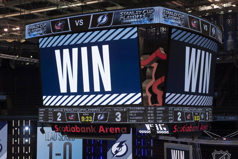 ASSOCIATED PRESS
                                The scoreboard is shown after the Tampa Bay Lightning defeated the Columbus Blue Jackets five overtimes in Game 1 of an NHL hockey Stanley Cup first-round playoff series Tuesday in Toronto.