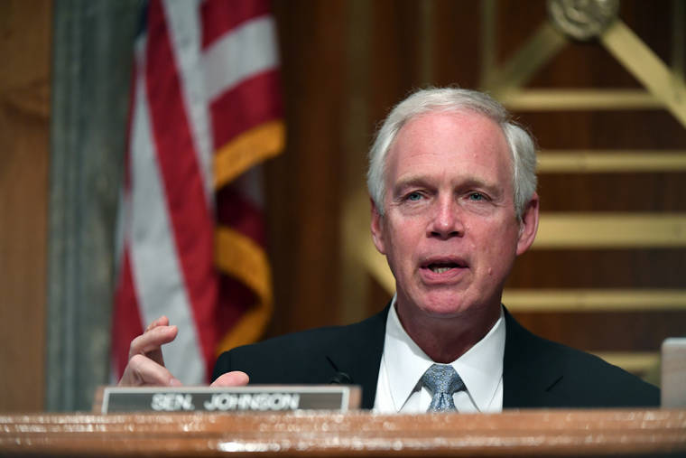 TONI SANDYS/THE WASHINGTON POST VIA ASSOCIATED PRESS
                                Sen. Ron Johnson, R-Wis., spoke, Aug. 6, during a Senate Homeland Security and Governmental Affairs Committee hearing on Capitol Hill in Washington. Johnson defended his committee’s investigation into Ukraine and Joe Biden from criticism that his probe is politically motivated and advancing Russian interests.