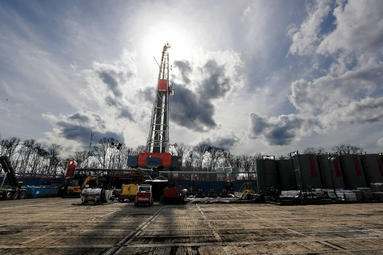 ASSOCIATED PRESS
                                The sun shined through clouds, March 12, above a shale gas drilling site in St. Mary’s, Pa. President Donald Trump’s administration is undoing Obama-era rules designed to limit potent greenhouse gas emissions from oil and gas fields and pipelines