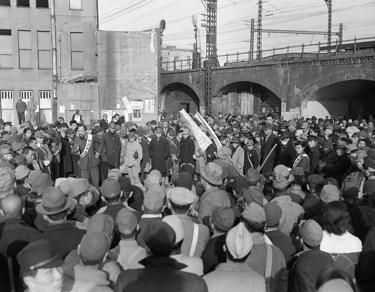 ASSOCIATED PRESS FILE
                                A crowd gathers at Shimbashi railroad station in Tokyo for a hunger demonstration by residents of the city on Dec. 16, 1945.