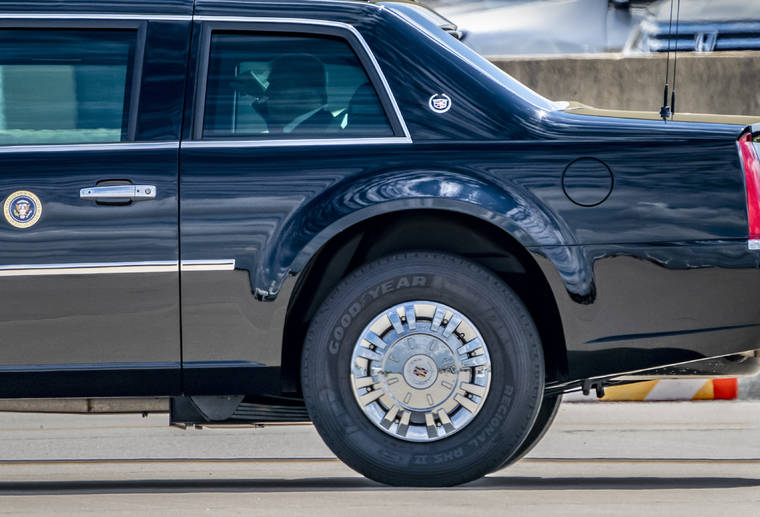 ASSOCIATED PRESS
                                President Donald Trump rides in the heavily armored limousine known as “the beast” which rolls on specially-made Goodyear tires, at Joint Base Andrews in Suitland, Md. Trump is urging people not to buy tires from Goodyear amid claims that the Ohio-based manufacturer has banned his MAGA campaign hats.