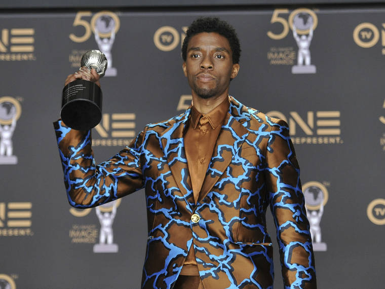 INVISION/AP
                                Chadwick Boseman poses in the press room with the award for outstanding actor in a motion picture for “Black Panther” at the 50th annual NAACP Image Awards at the Dolby Theatre in Los Angeles on March 30, 2019.