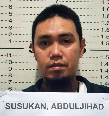 PHILIPPINE NATIONAL POLICE PIO VIA ASSOCIATED PRESS
                                Abu Sayyaf commander Anduljihad Susukan posed for a picture at the Davao City Police Station in Davao province, southern Philippines on Thursday. Susukan, a leading terror suspect who has been linked to beheadings of hostages including two Canadians and a Malaysian, surrendered after being wounded in battle, officials said Friday.