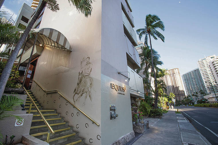 CINDY ELLEN RUSSELL / CRUSSELL@STARADVERTISER.COM
                                The Equus Hotel is one of the Waikiki hotels that will reportedly be allocating rooms for quarantine and isolation purposes.