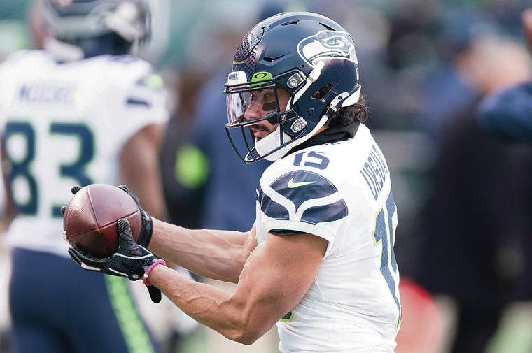 ASSOCIATED PRESS
                                Former University of Hawaii receiver John Ursua was cleared to return to practice with the Seattle Seahawks after testing negative for COVID-19.