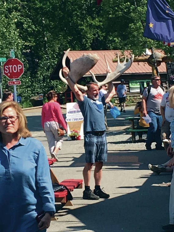 ASSOCIATED PRESS
                                Tourists browse a crowded Main Street in downtown Talkeetna, Alaska, in 2018. This summer, streets are pretty quiet in Talkeetna after most major cruise ship companies canceled their tourist seasons due to the coronavirus pandemic. Some Americans are setting their sights on the state as a domestic destination once they feel more safe to travel again.