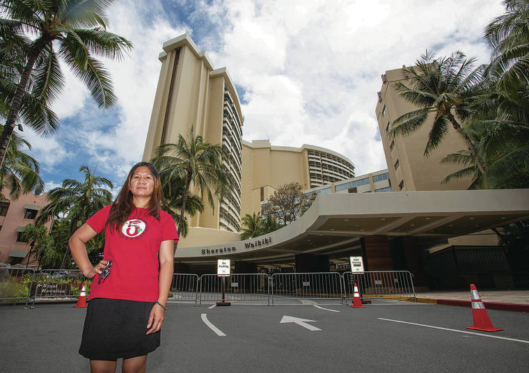 CINDY ELLEN RUSSELL / CRUSSELL@STARADVERTISER.COM
                                Geraldine Acoba works at the Sheraton Waikiki and is one of thousands of workers across the island who want to get back to work but are concerned about safety conditions due to the coronavirus pandemic.