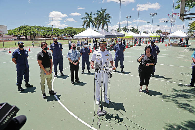 JAMM AQUINO / JAQUINO@STARADVERTISER.COM
                                U.S. Surgeon General Vice Adm. Jerome Adams spoke during a news conference Thursday at Kalakaua District Park in Honolulu on the second day of surge COVID-19 testing.