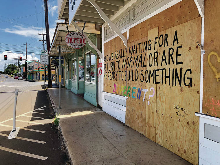 CHRISTIE WILSON / CWILSON@STARADVERTISER.COM
                                Before the pandemic took hold, Paia’s sidewalks were jammed with visitors and locals enjoying the seaside town’s eclectic mix of boutiques, restaurants and galleries. Now, many stores are boarded up or vacant.