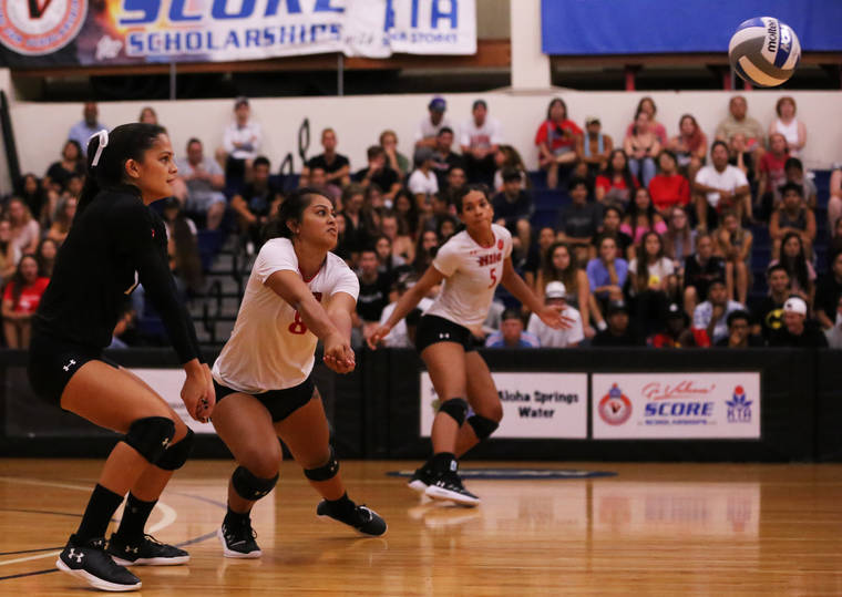 COURTESY SHELLY BLUNCK/UHH ATHLETICS
                                Hawaii Hilo’s Taira Kaawaloa passes the ball in front of libero Kaila Lizama during a match in 2019. The Vulcans advanced to the NCAA Division II West Regional in December.