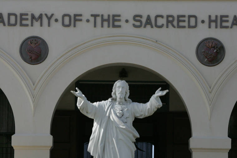 STAR-ADVERTISER
                                The front of the main building of Sacred Hearts Academy. A Sacred Hearts Academy student who attended an event on campus last week has tested positive for COVID-19 and the school will start with distance learning next week, according to its president.