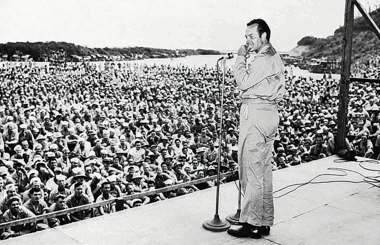 U.S. Army
                                Bob Hope performs for serv­icemen in the Solomon Islands in 1944.