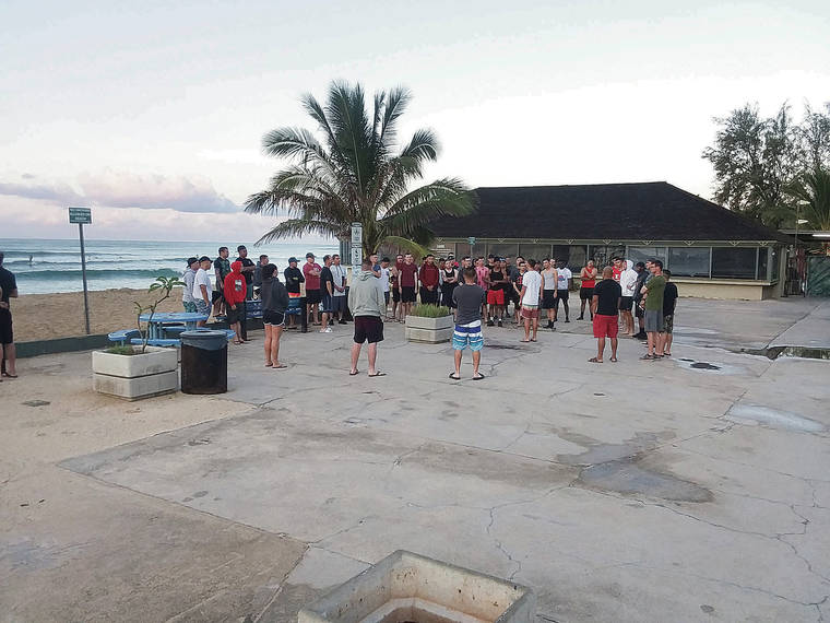 COURTESY MICHAEL NII
                                A group believed to be Schofield Barracks soldiers gathered July 23 at White Plains beach.