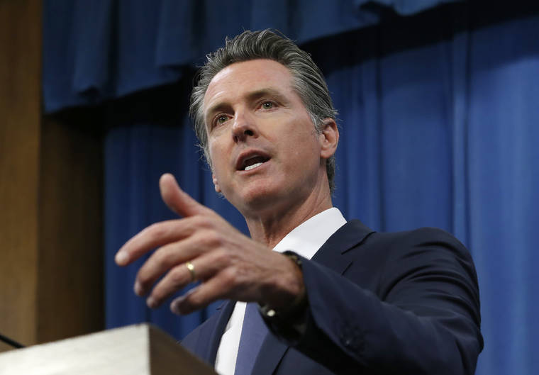 ASSOCIATED PRESS
                                Gov. Gavin Newsom talked to reporters, in July 2019, at his Capitol office, in Sacramento, Calif. California lawmakers, Monday, moved to use the most populous state’s market power to lower the cost and increase the availability of prescription drugs for its nearly 40 million residents.