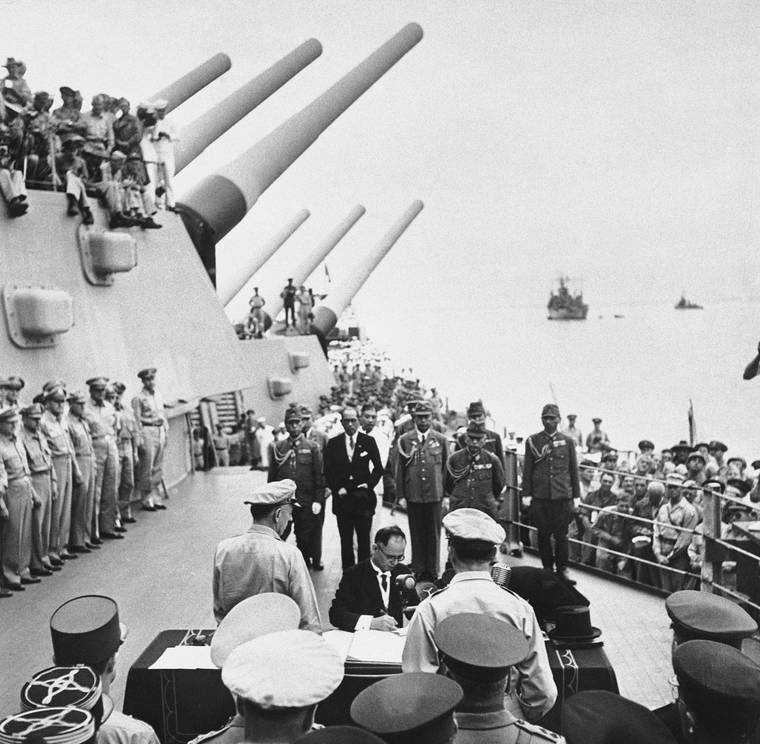 POOL PHOTO VIA ASSOCIATED PRESS / SEPT. 1945
                                Japanese Foreign Minister Mamoru Shigemitsu signed the Japanese Instrument of Surrender, a document signed on the deck of the USS Missouri in Tokyo Bay, Japan. Today is the 75th anniversary of the formal Sept. 2, 1945, surrender of Japan to the United States, when the two sides signed documents officially ending years of bloody fighting in a ceremony aboard the USS Missouri in the Tokyo Bay, with an armada of American warships and planes hovering nearby.