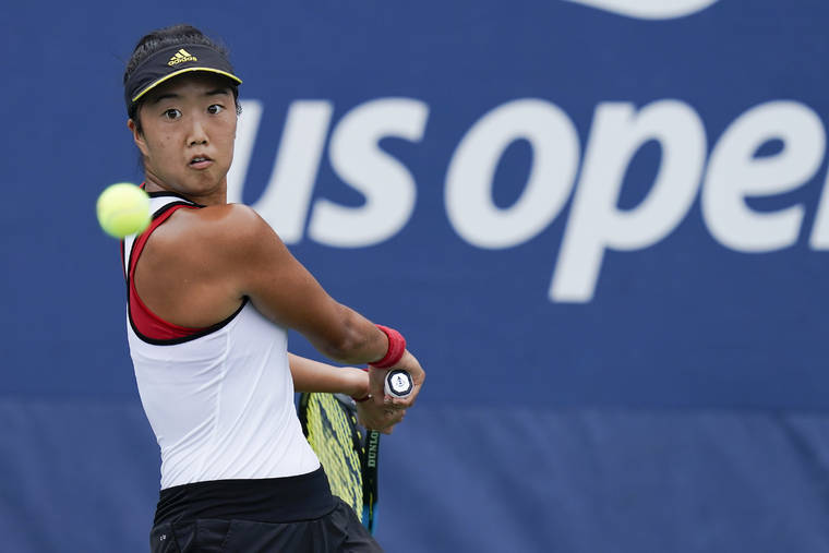 ASSOCIATED PRESS
                                Ann Li, of the United States, serves to Alison Riske, of the United States, during the second round of the US Open tennis championships today in New York.