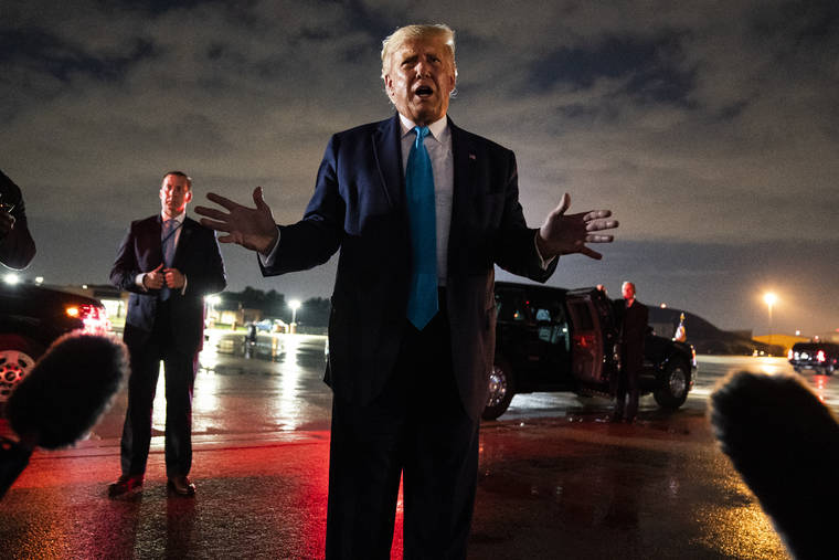 ASSOCIATED PRESS
                                President Donald Trump talked with reporters at Andrews Air Force Base after attending a campaign rally in Latrobe, Pa., Thursday, at Andrews Air Force Base, Md.