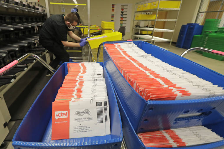 ASSOCIATED PRESS
                                Vote-by-mail ballots were shown in sorting trays, Aug. 5, at the King County Elections headquarters in Renton, Wash., south of Seattle. With the coronavirus creating a surge in mail-in balloting and postal delays reported across the country, the number of rejected ballots in November is projected to be significantly higher than previous elections.
