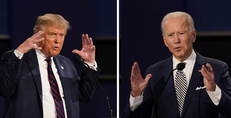 ASSOCIATED PRESS
                                A combination of two photos showing both President Donald Trump, left, and former Vice President Joe Biden during the first presidential debate, Tuesday, at Case Western University and Cleveland Clinic, in Cleveland, Ohio.
