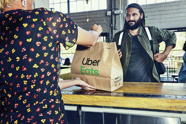 COURTESY UBER EATS
                                Typically, services like Bite Squad, Uber Eats, DoorDash and Grubhub take orders through their websites and apps, then send drivers to pick up and deliver the food. They normally charge both restaurants and customers for the service.