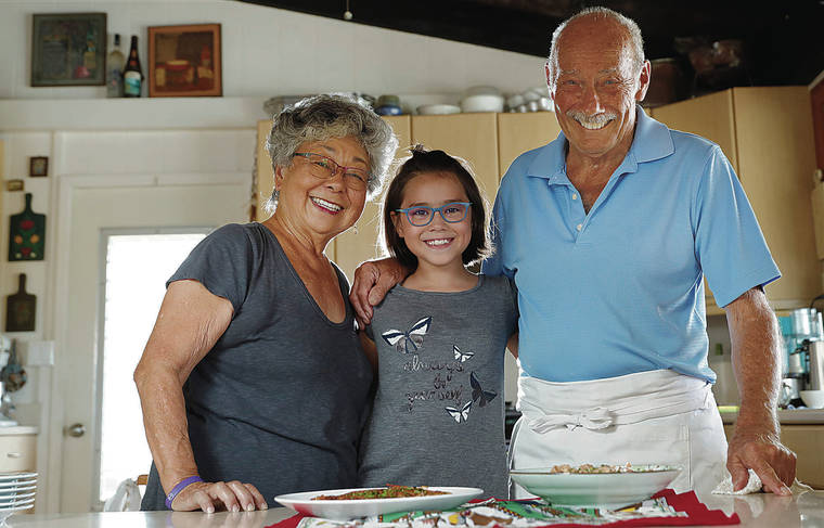 JAMM AQUINO / JAQUINO@STARADVERTISER.COM
                                Chef Martin Wyss with his wife, Jeanie, and granddaughter, Aeryn Torres-Wyss, 9. Aeryn visited for the summer from her home in Portland, Ore.