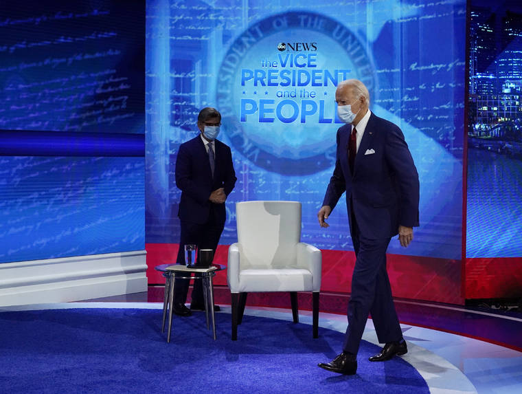 ASSOCIATED PRESS
                                Democratic presidential candidate former Vice President Joe Biden arrives to participate in a town hall with moderator ABC News anchor George Stephanopoulos at the National Constitution Center in Philadelphia.