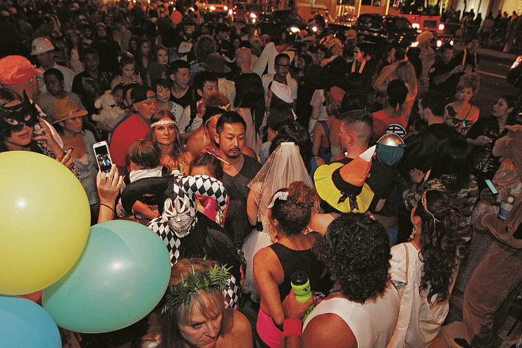 STAR-ADVERTISER / 2013
                                Waikiki is known to attract large crowds on Halloween. Residents worry that Saturday’s festivities could lead to another surge in coronavirus cases.
