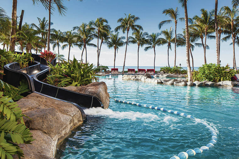 COURTESY SHERATON
                                The Helumoa Playground is a shared pool area for guests of the Royal Hawaiian and Sheraton Waikiki hotels that boasts a 70-foot-long water slide.