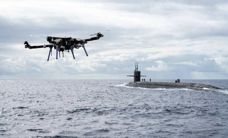 U.S. NAVY / MASS COMMUNICATION SPECIALIST 1ST CLASS DEVIN M. LANGER
                                An unmanned aerial vehicle delivered a payload to the Ohio-class ballistic-missile submarine USS Henry M. Jackson (SSBN 730), Oct. 19, near the Hawaiian Islands.