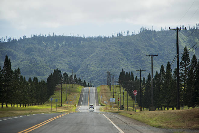 STAR-ADVERTISER / 2017
                                The island of Lanai is experiencing a growing cluster of COVID-19 cases with several dozen being reported by Maui health authorities. This file photo from 2017 shows the nearly empty road from the Lanai Airport to Lanai City.