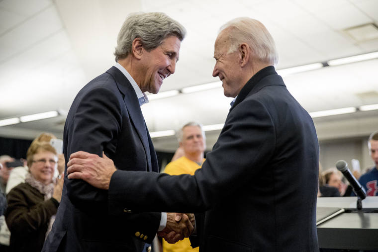 ASSOCIATED PRESS / FEBRUARY 1
                                Democratic presidential candidate former Vice President Joe Biden smiles as former Secretary of State John Kerry, left, takes the podium to speak at a campaign stop at the South Slope Community Center in North Liberty, Iowa.