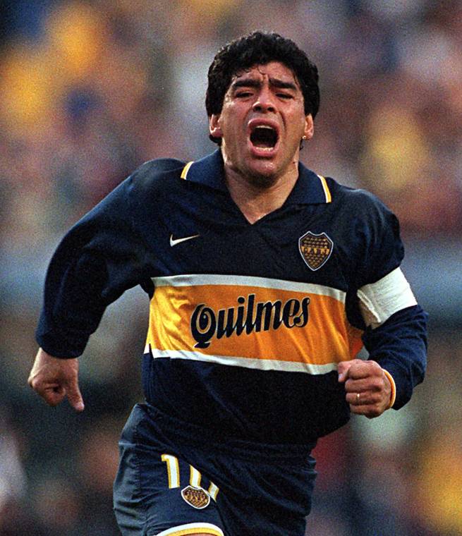 ASSOCIATED PRESS / OCT. 25, 1997
                                Diego Armando Maradona celebrates a goal on his last official soccer game with Boca Juniors in Buenos Aires, Argentina, in 1997. The Argentine soccer great who was among the best players ever and who led his country to the 1986 World Cup title before later struggling with cocaine use and obesity, died from a heart attack today at his home in Buenos Aires. He was 60.